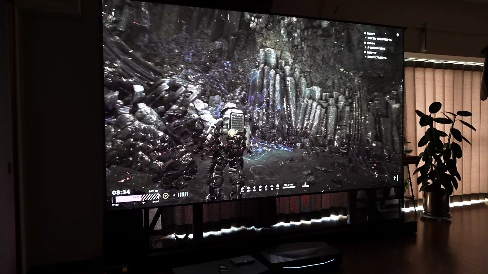 120インチのスクリーンいっぱいに投影したゲームのプレイ画面